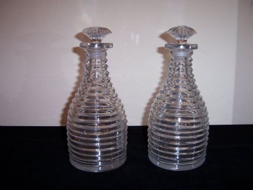 a fine pair of regency step cut glass decanters