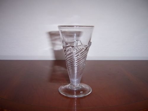 a rare early 18th century flamiform wrythen dwarf ale glass