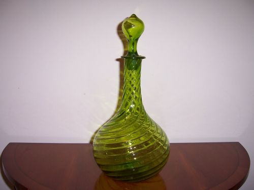 a victorian green glass wrythen twist decanter