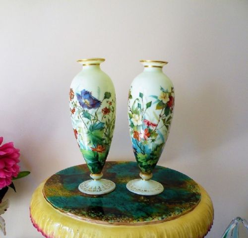 a superb pair of mid 19th century enamelled opaline glass vases