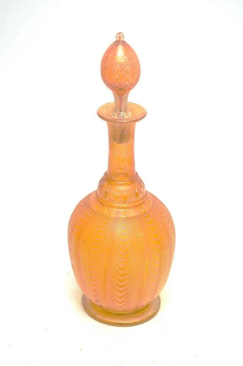 a rare large 19th century amber glass decanter with white pull up and threaded decoration