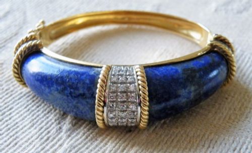 a rare vintage diamond 18 carat gold and lapis lazuli bangle from the van cleef and arpels phillipine range