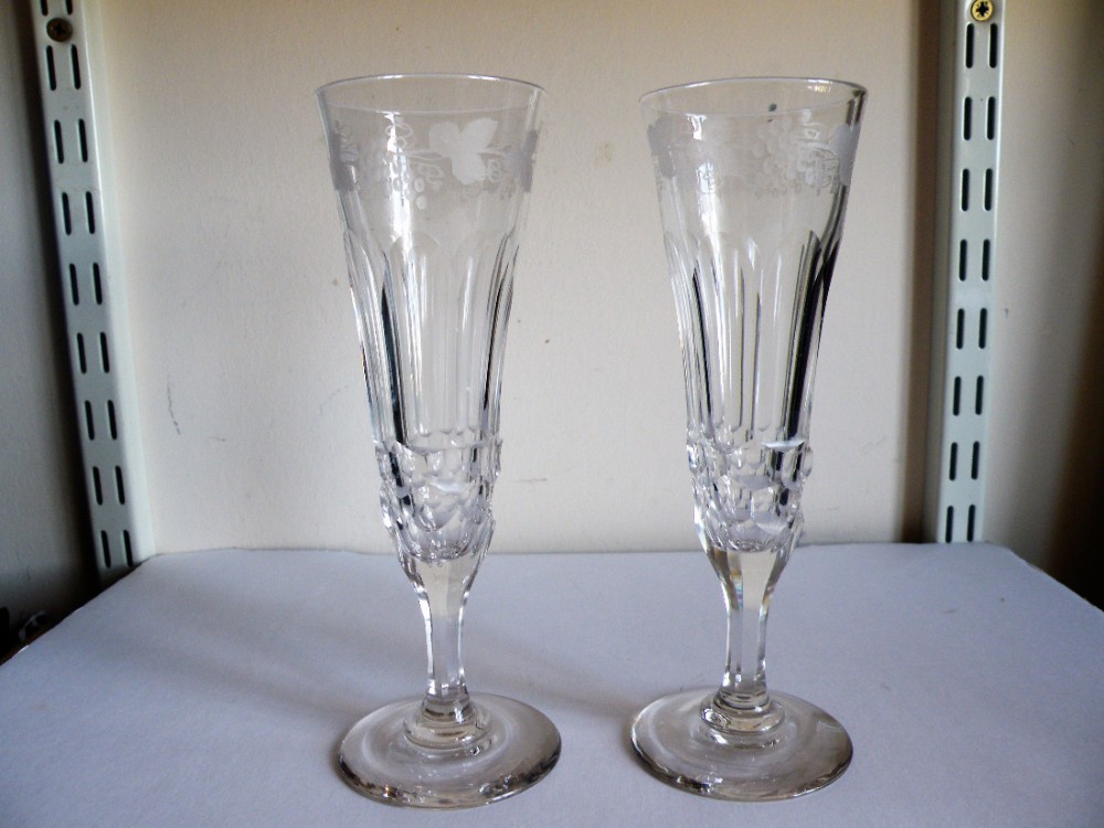 a fine pair of cut and engraved regency champagne flutes