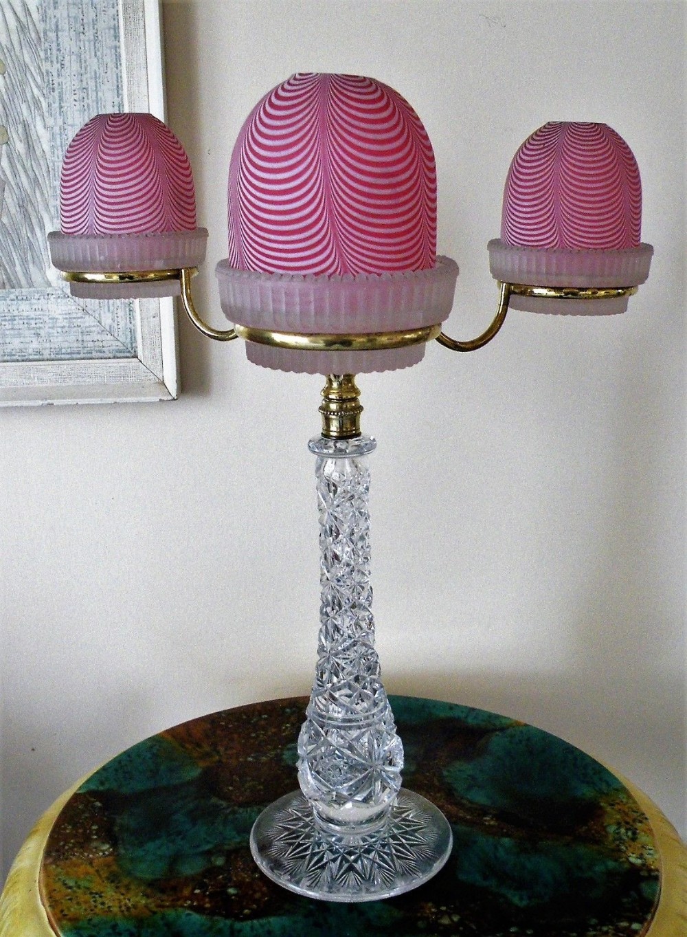 a rare victorian cricklite 3 light candelabra with three verre moire domes