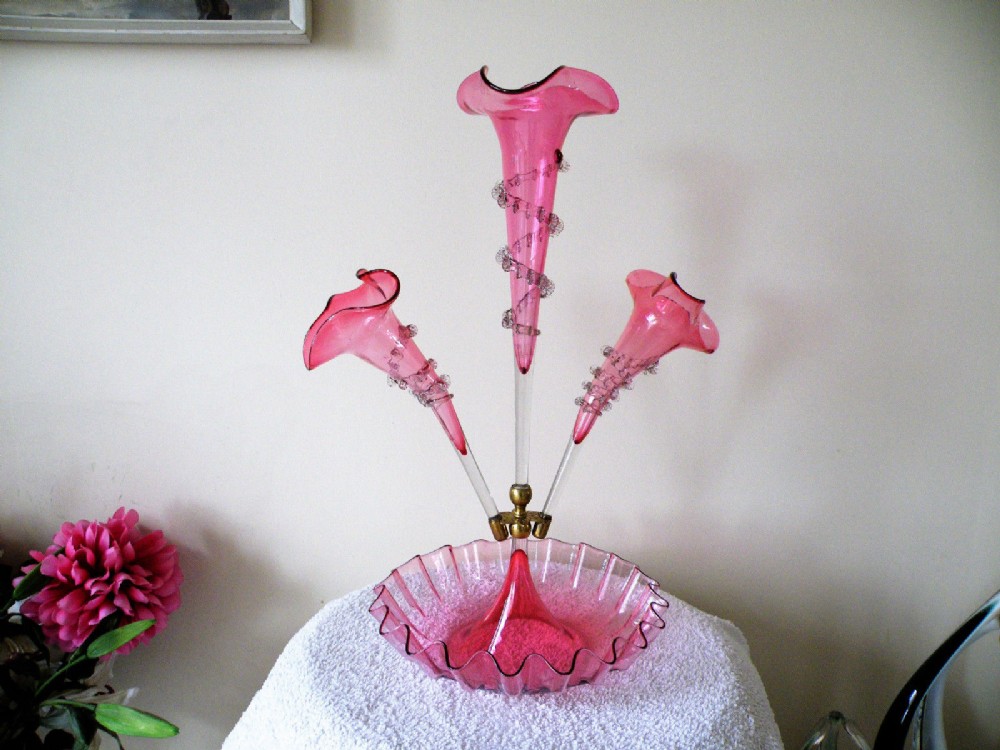 a victorian cranberry glass three trumpet epergne