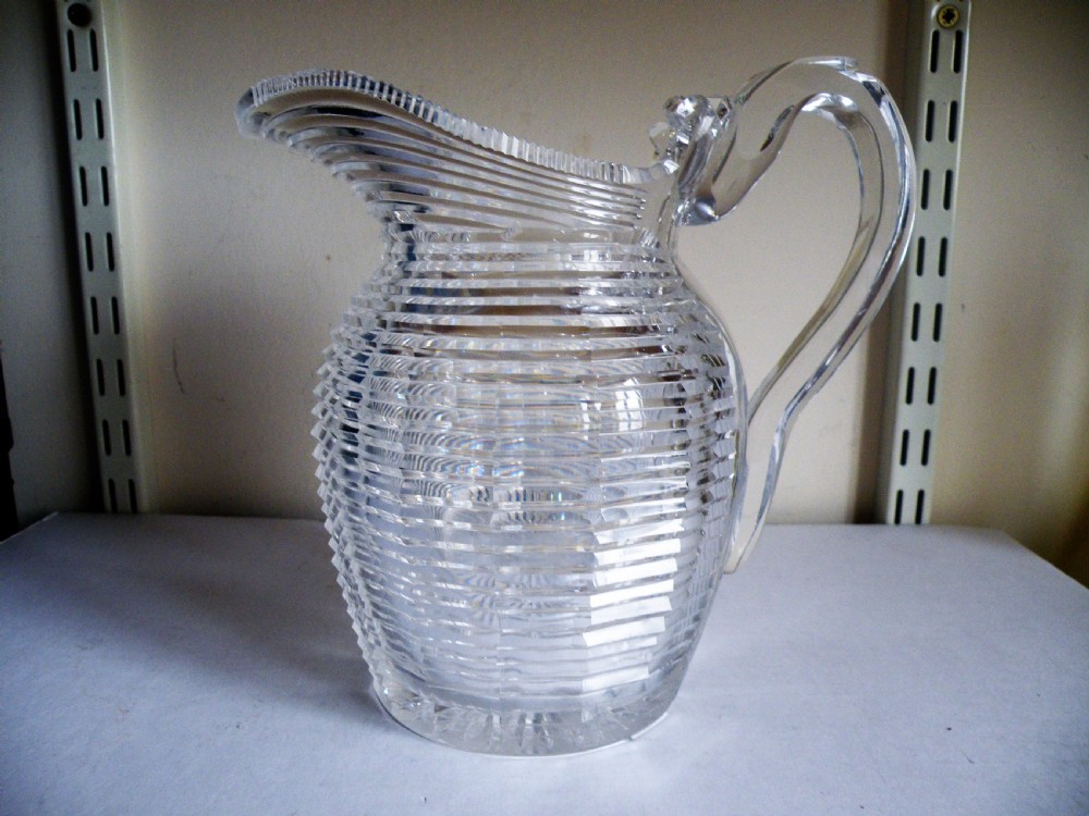 a large fine regency step cut glass jug