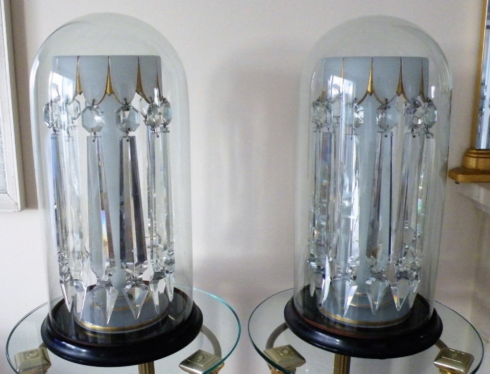 an exceptional large pair of mid 19th century opaline glass lusters under domes