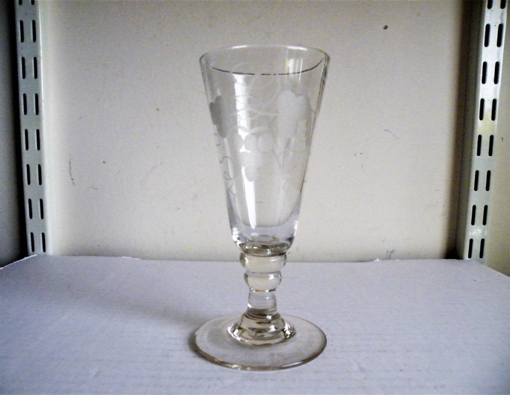 an 18th century engraved short ale glass