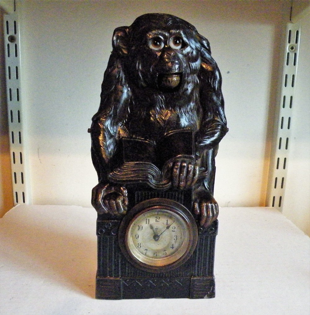 an unusual 19th century automaton metal monkey clock