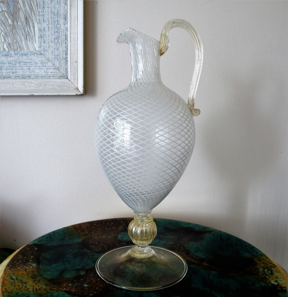 a large 19th century venetian latticino glass wine jug