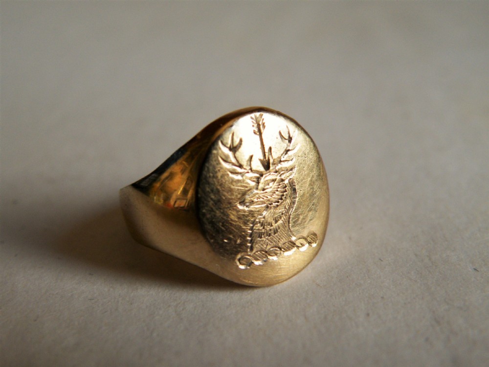 a vintage solid 9 carat gold armorial crest signet ring