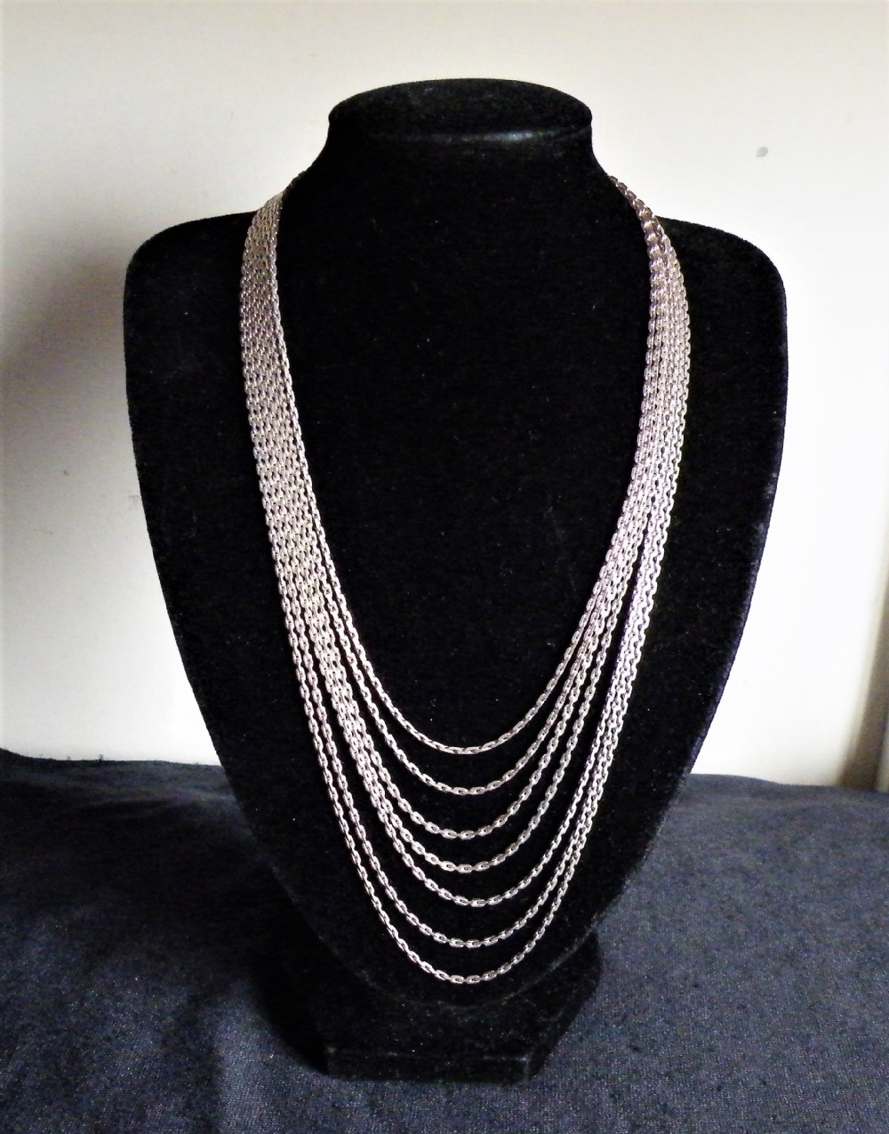 a quality vintage solid silver seven strand necklace