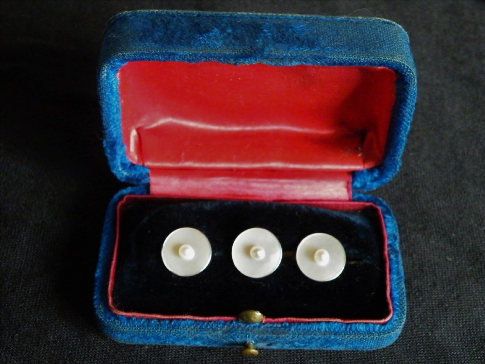 a good set of three edwardian 15 carat gold pearl and mother of pearl gentlemans dress studs