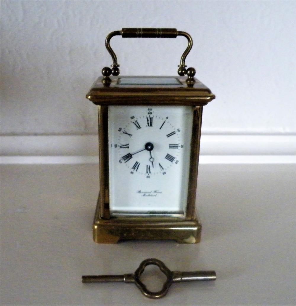 a brass framed carriage clock timepiece bornand freres montbeliard