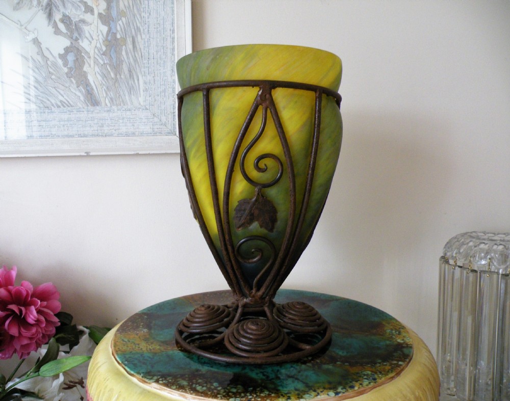 a stylish large art deco glass and iron vase