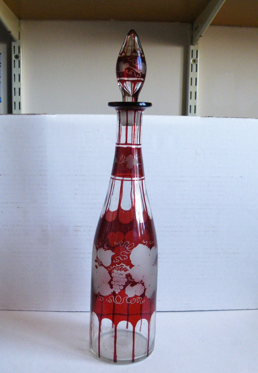 a 19th century bohemian cranberry flashed and etched decanter