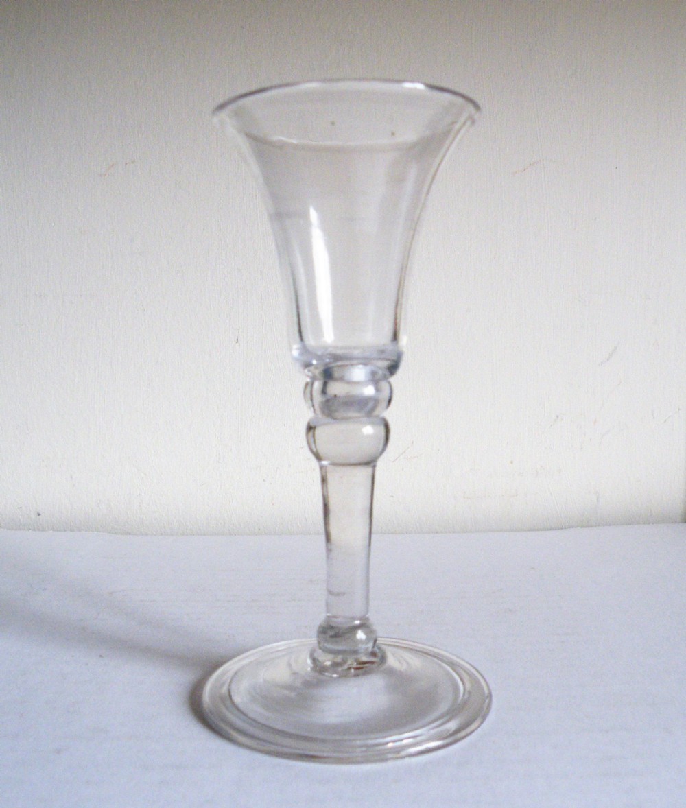 an early 18th century wine or gin glass circa 1730