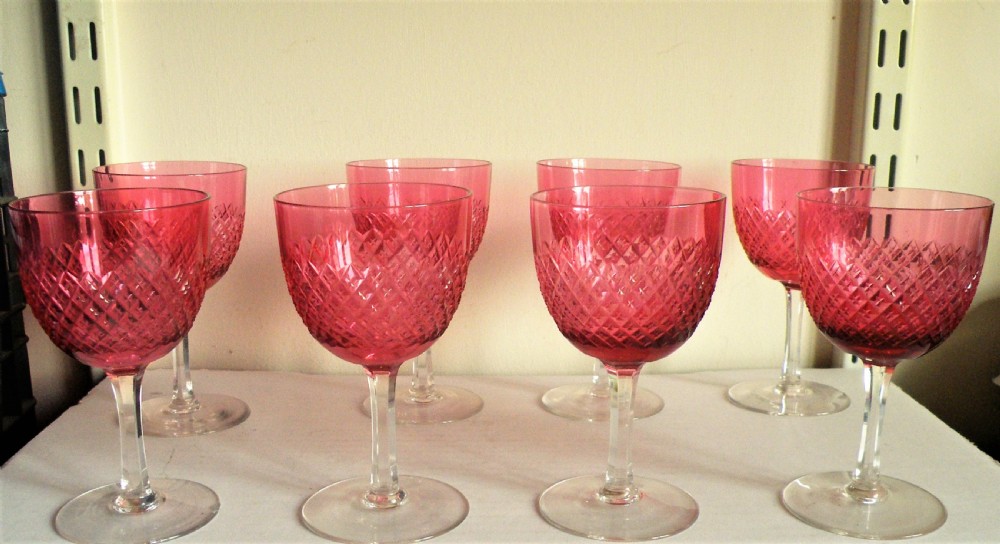 a nice set of eight victorian cut cranberry wine glasses