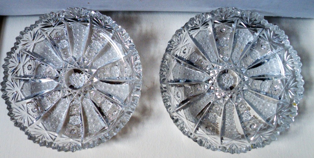 a nice pair of brilliant cut glass circular dishes