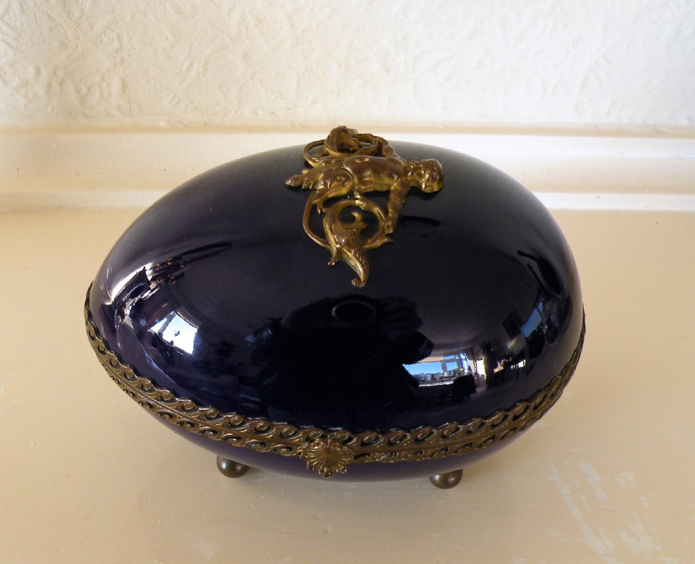 a good large sevres porcelain egg trinket box with brass mounts