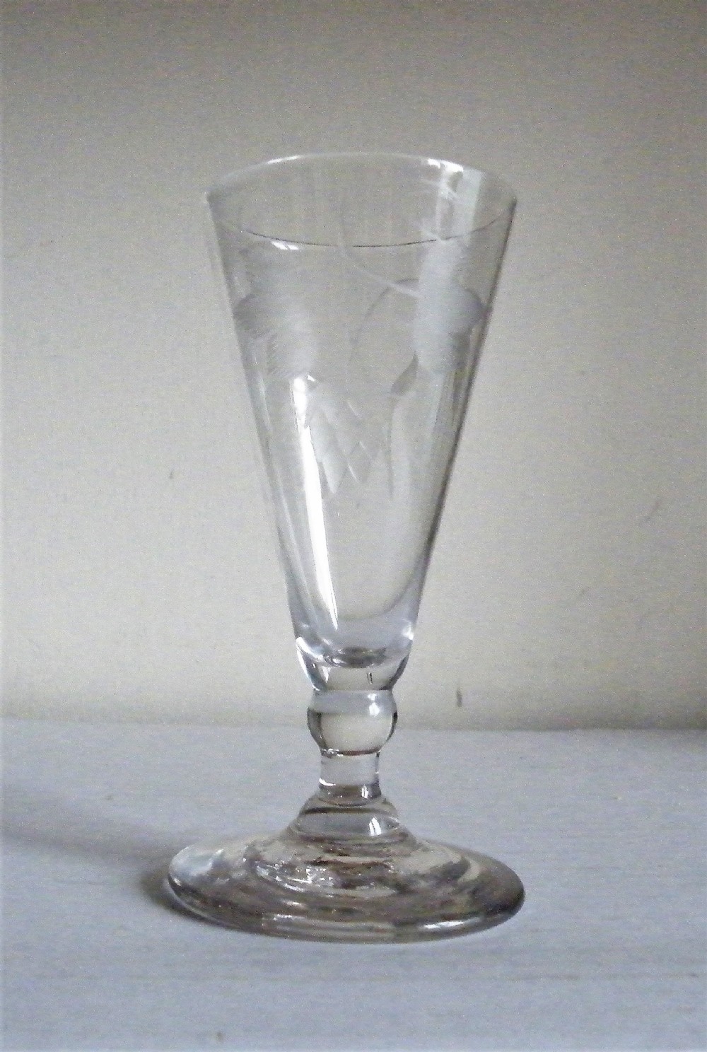 an 18th century engraved dwarf ale glass