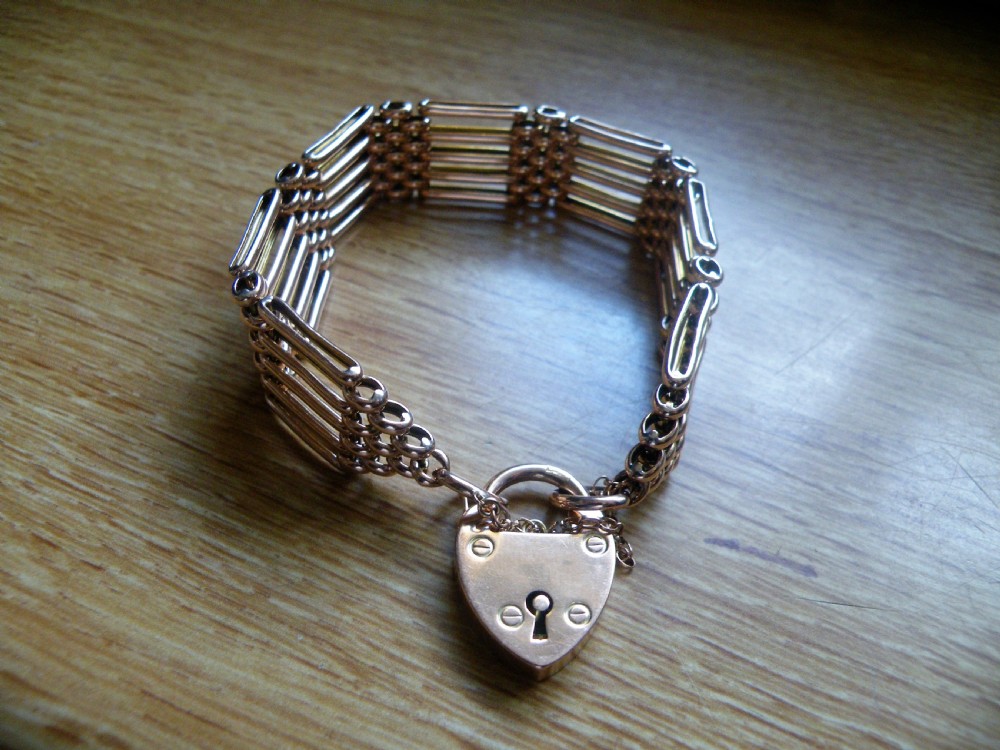 a fine quality edwardian 9 carat rose gold five bar gate bracelet and padlock