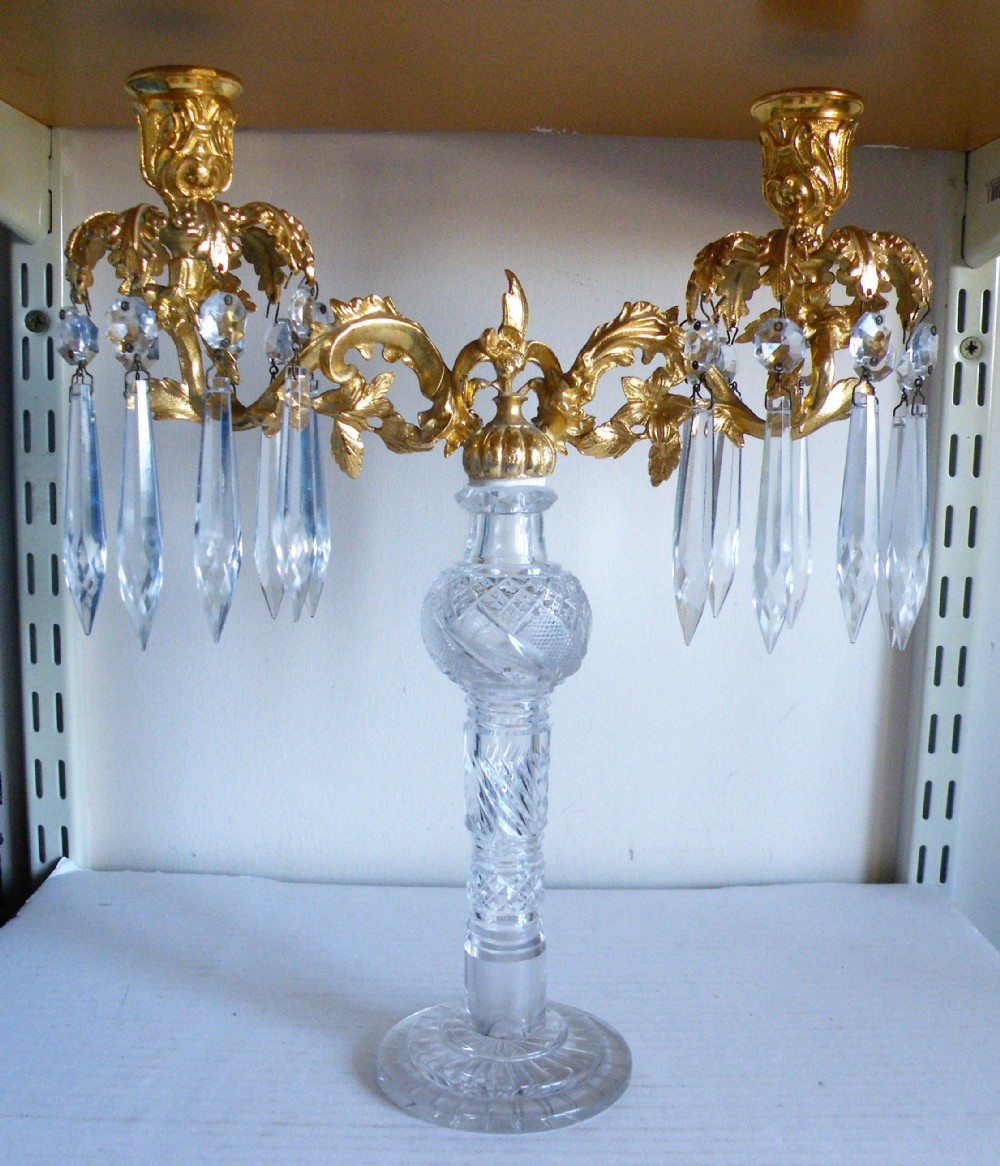 a good 19th century glass and gilded brass two light candelabra