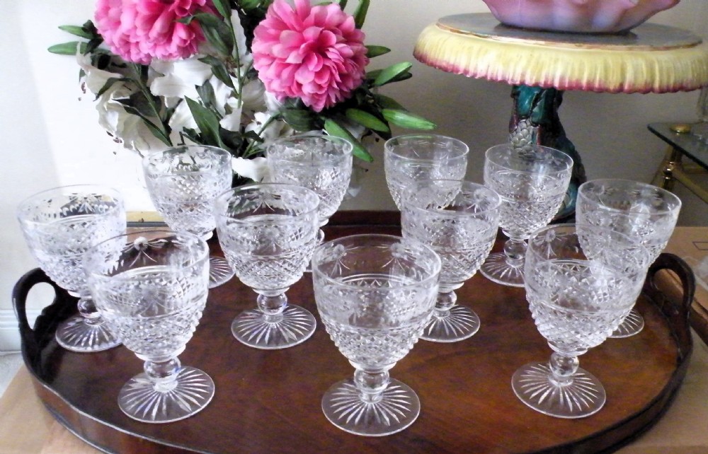 a lovely set of 11 stuart crystal cut and engraved large red wine glasses