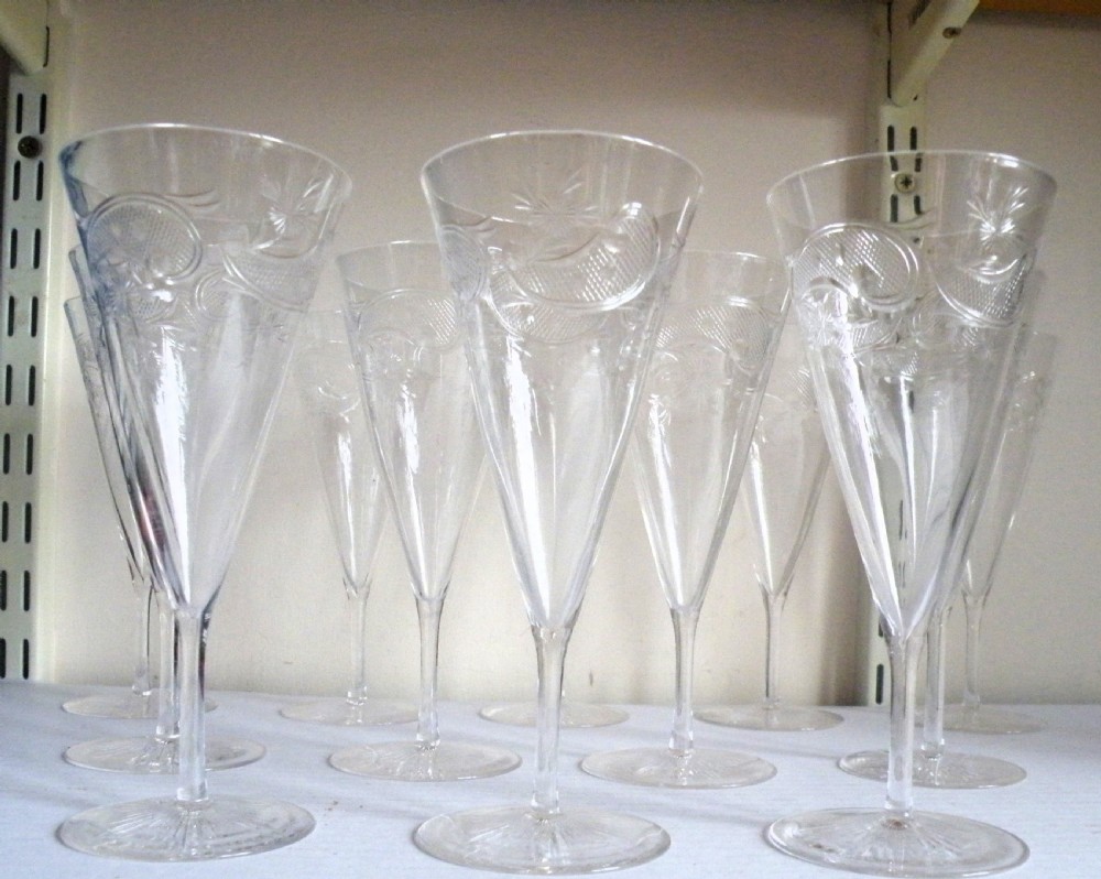 a fine and rare set of 12 victorian cut glass champagne glasses