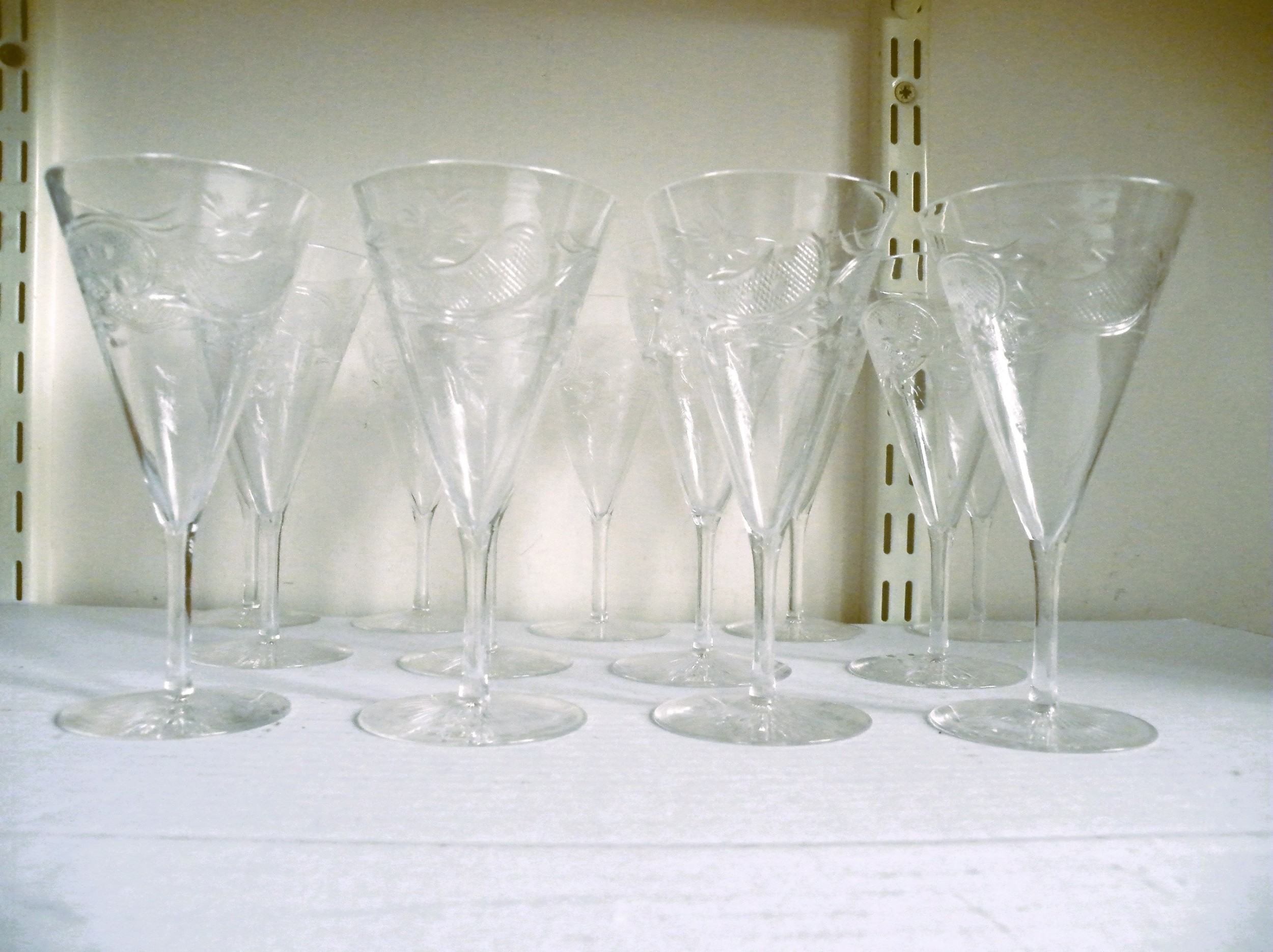 a fine and rare set of 13 victorian cut glass wine glasses