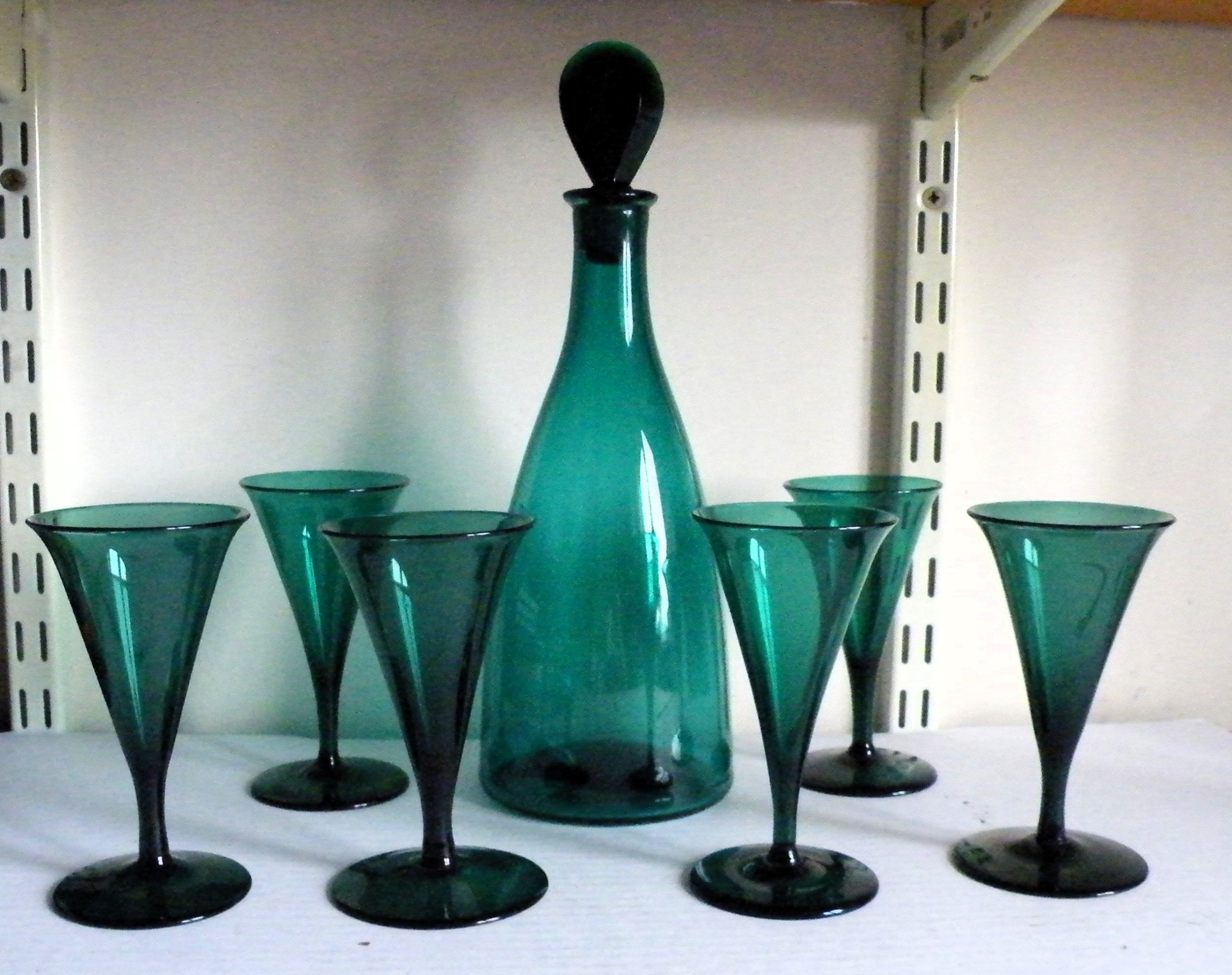 a fine set of six 18th century bristol green wine glasses with matching decanter