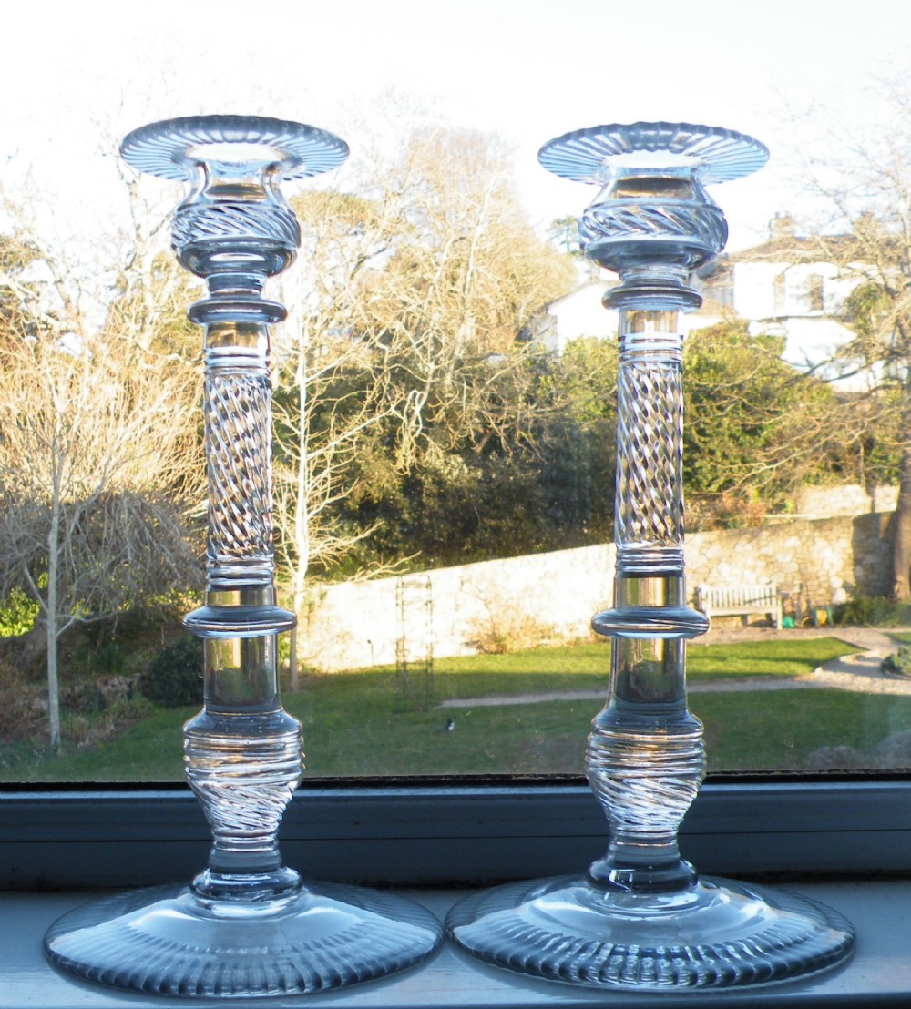 a fine tall pair of mid 19th century cut glass candelsticks
