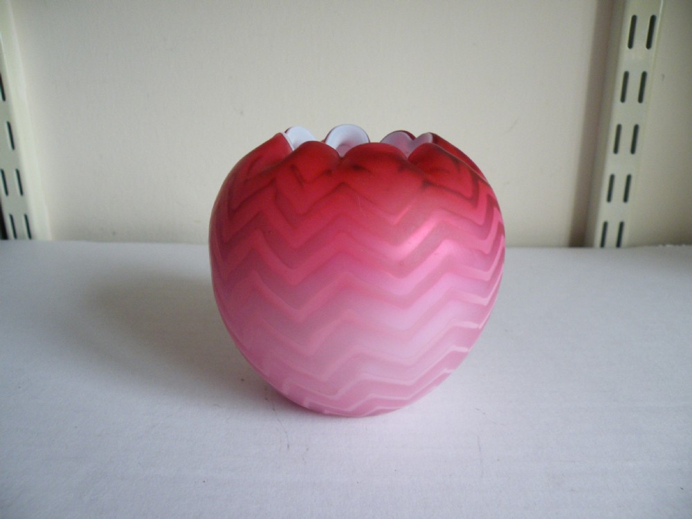 a victorian pink glass air trap cased satin glass posy vase