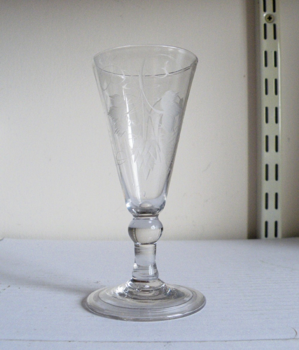 an 18th century engraved short ale glass