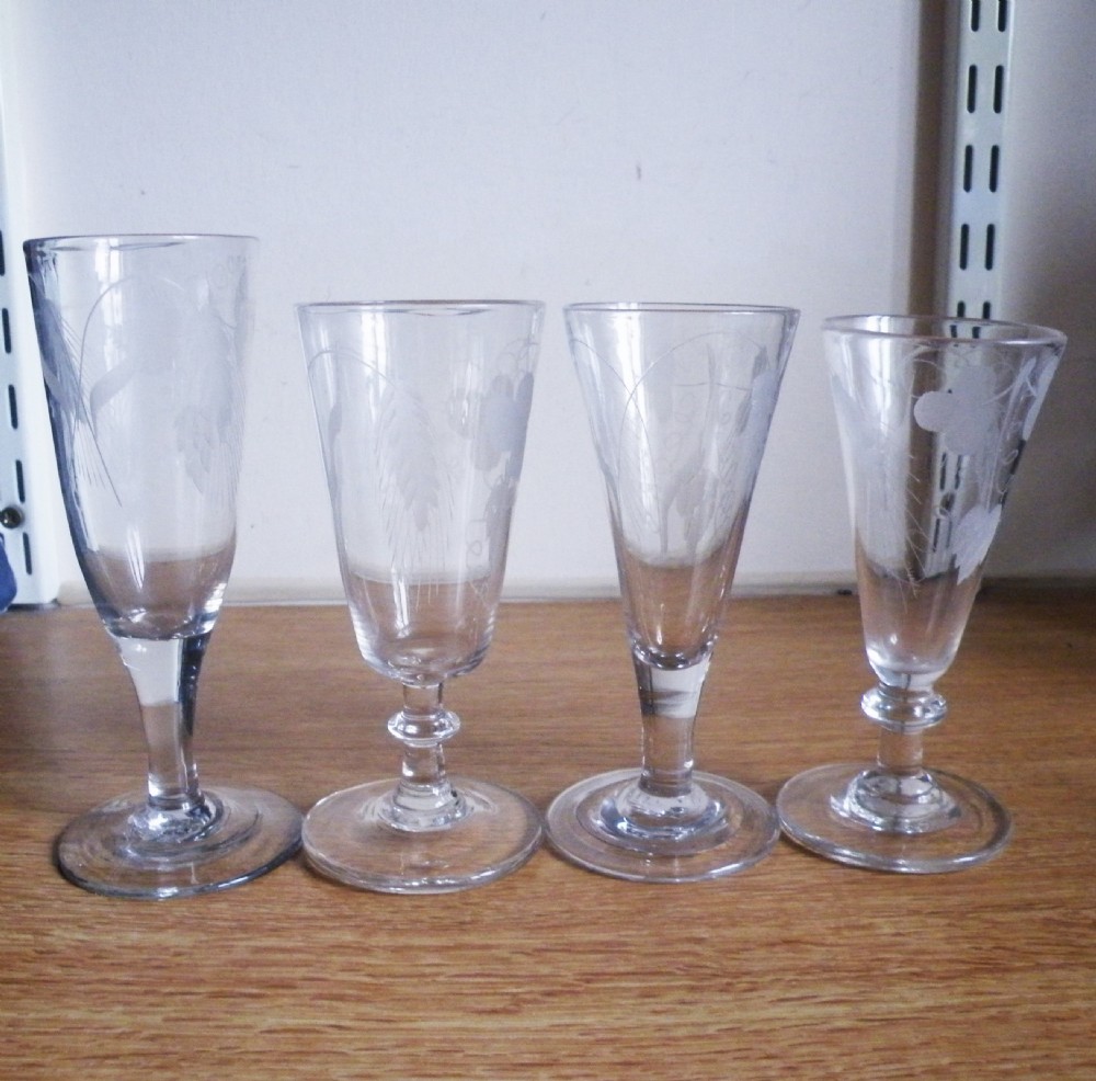 four 18th century engraved ale glasses