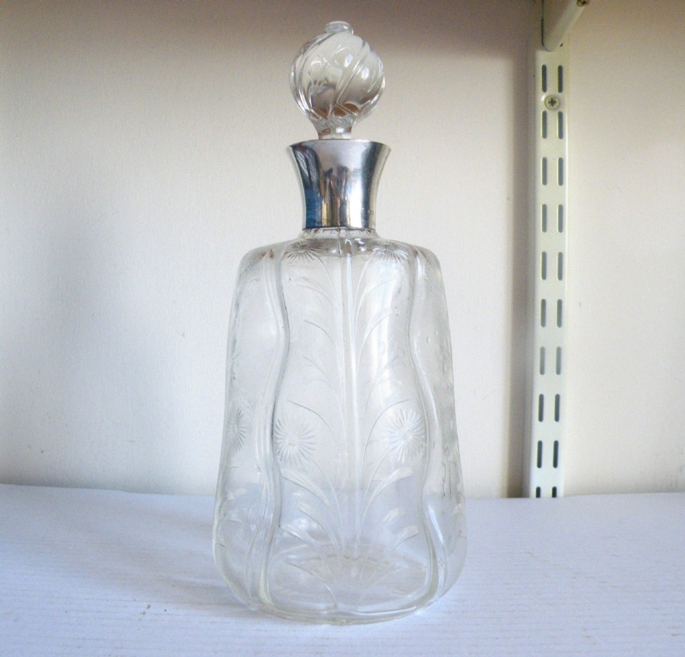 a lovely art nouveau engraved glass silver top decanter 1906