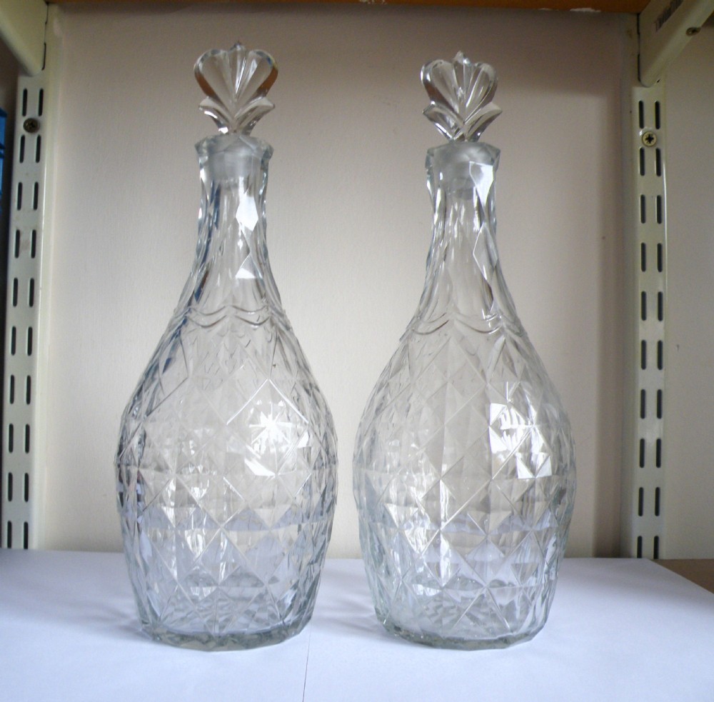 a rare and outstading pair of georgian facet cut body decanters