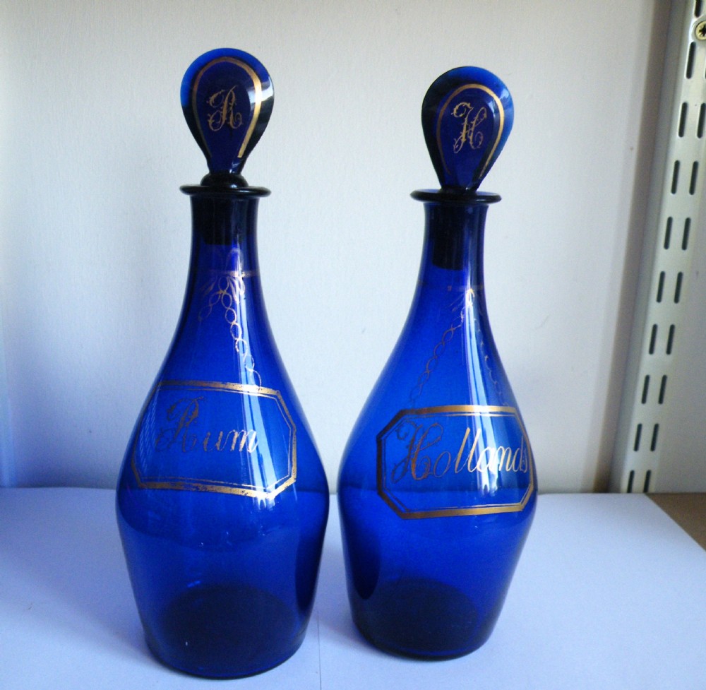 a pair of georgian bristol blue glass spirit decanters