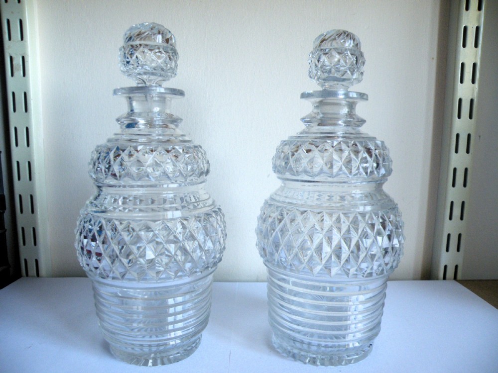 a good pair of georgian cut glass spirit decanters