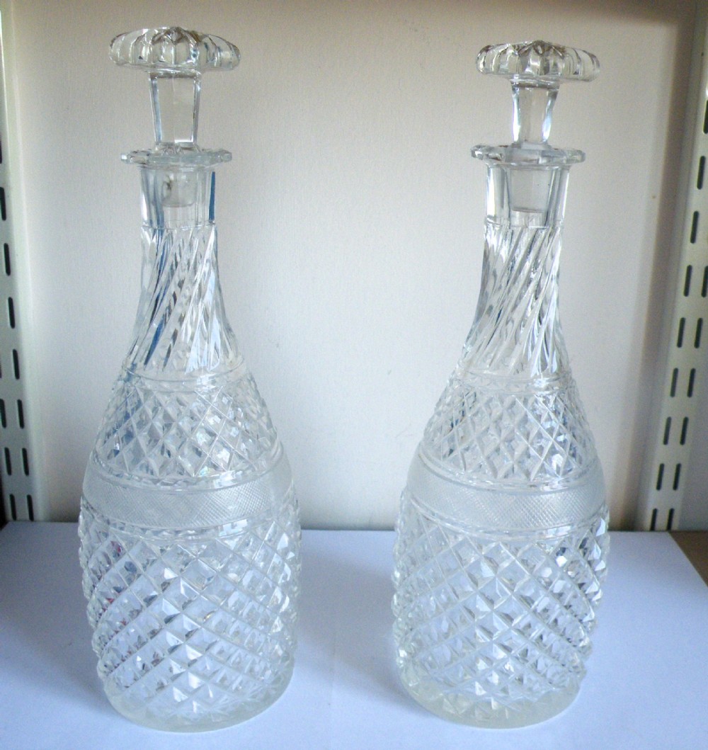 a tall pair of 19th century cut glass decanters