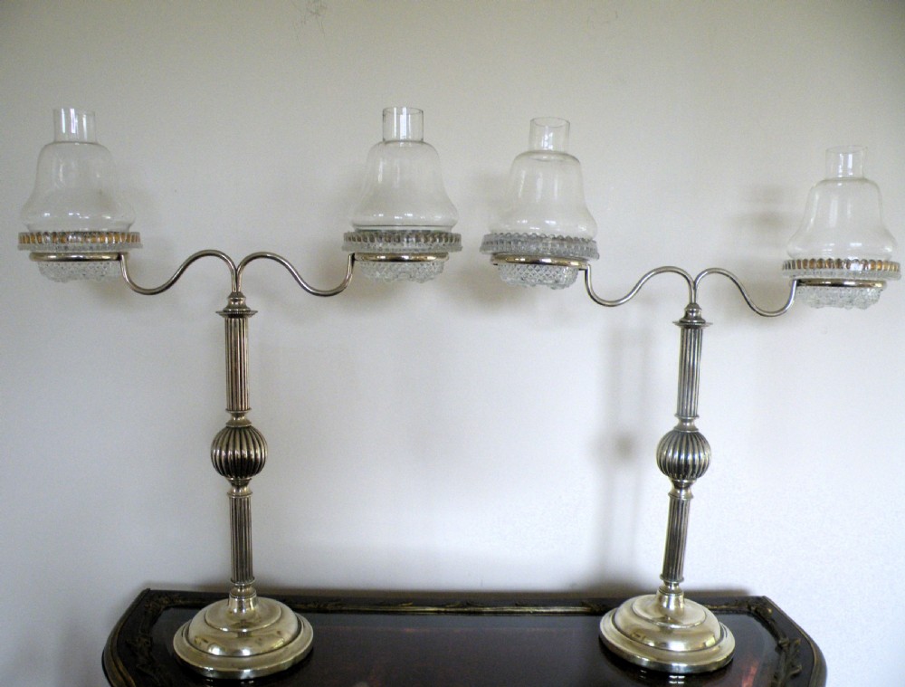 a good pair of victorian clarke's cricklite two light candelabra