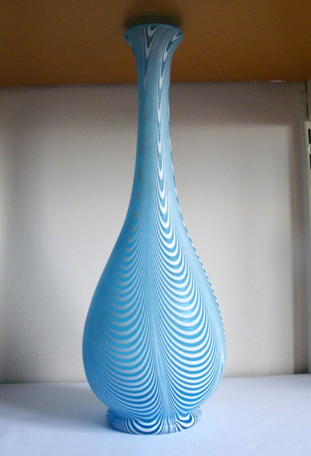 a lovely tall victorian blue and white verre moire vase