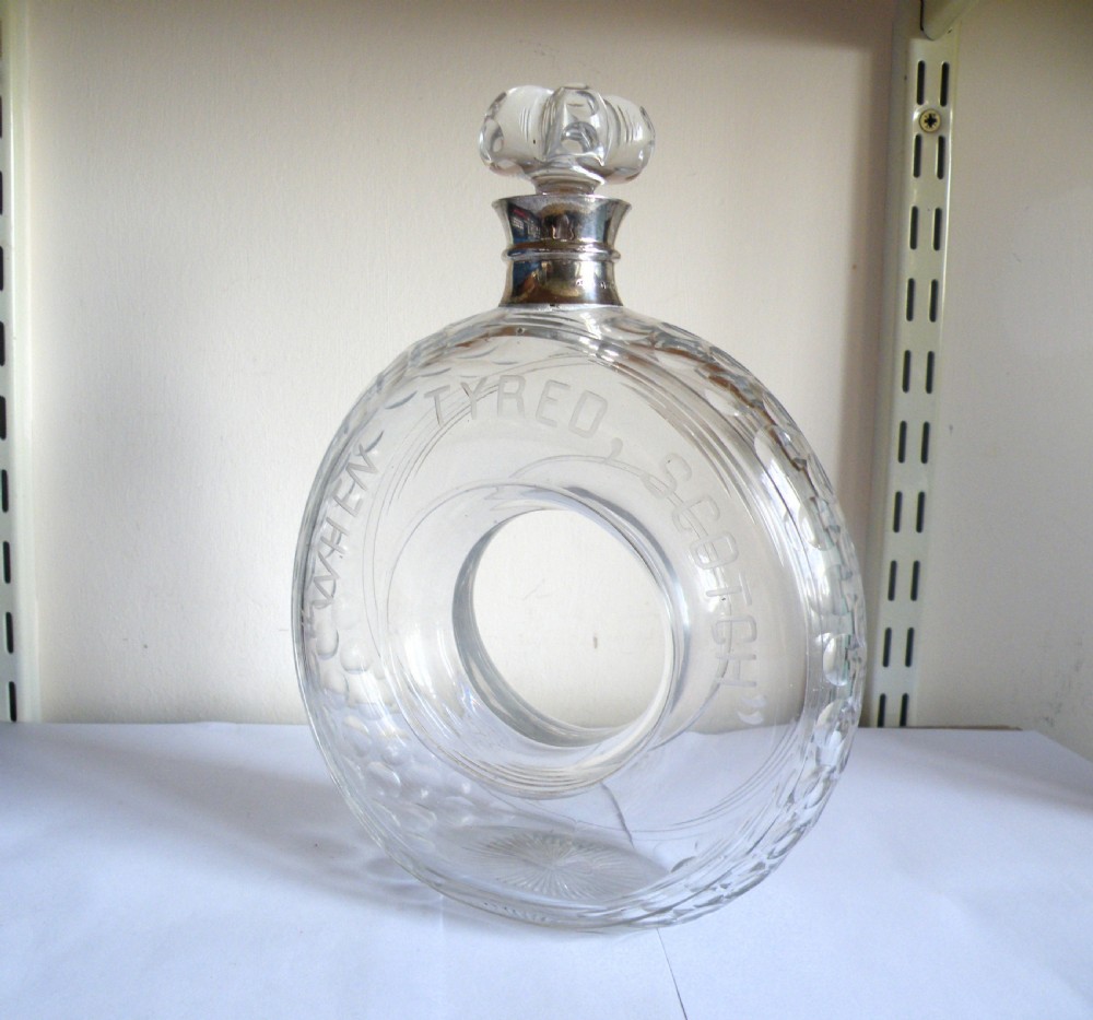 a rare 1908 glass tyre shape decanter engraved when tyred scotch