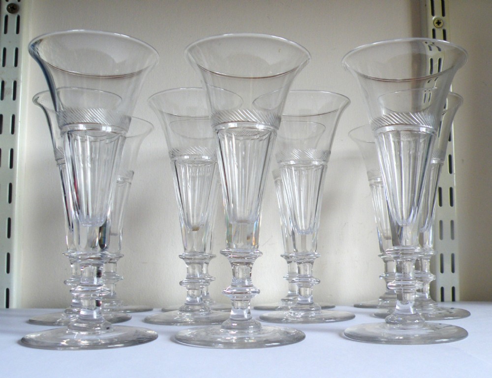 a fine set of eleven regency hand made champagne flutes circa 1820