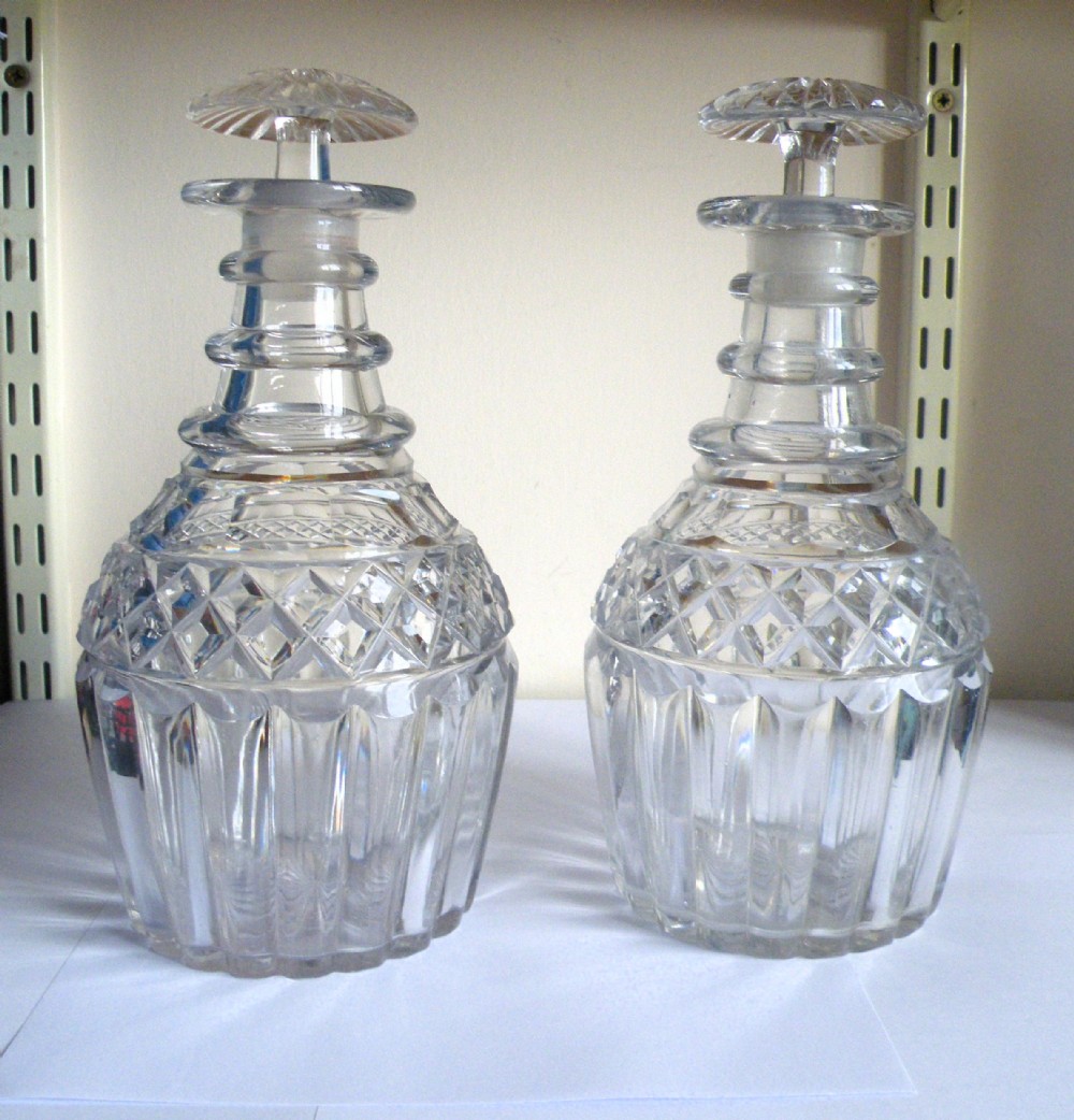 a fine quality pair of regency cut glass decanters