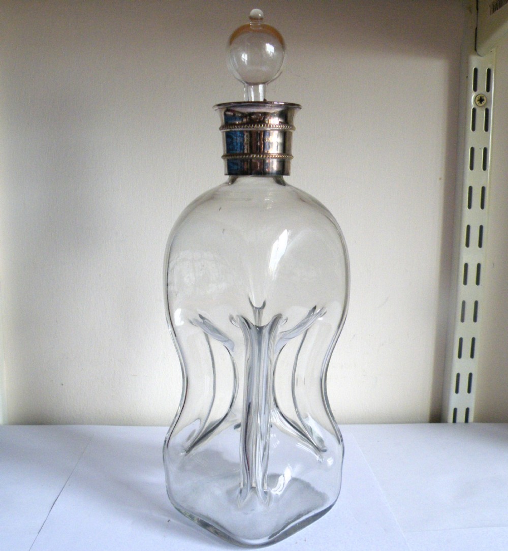 a late victorian glass glug glug decanter with silver plate mounts