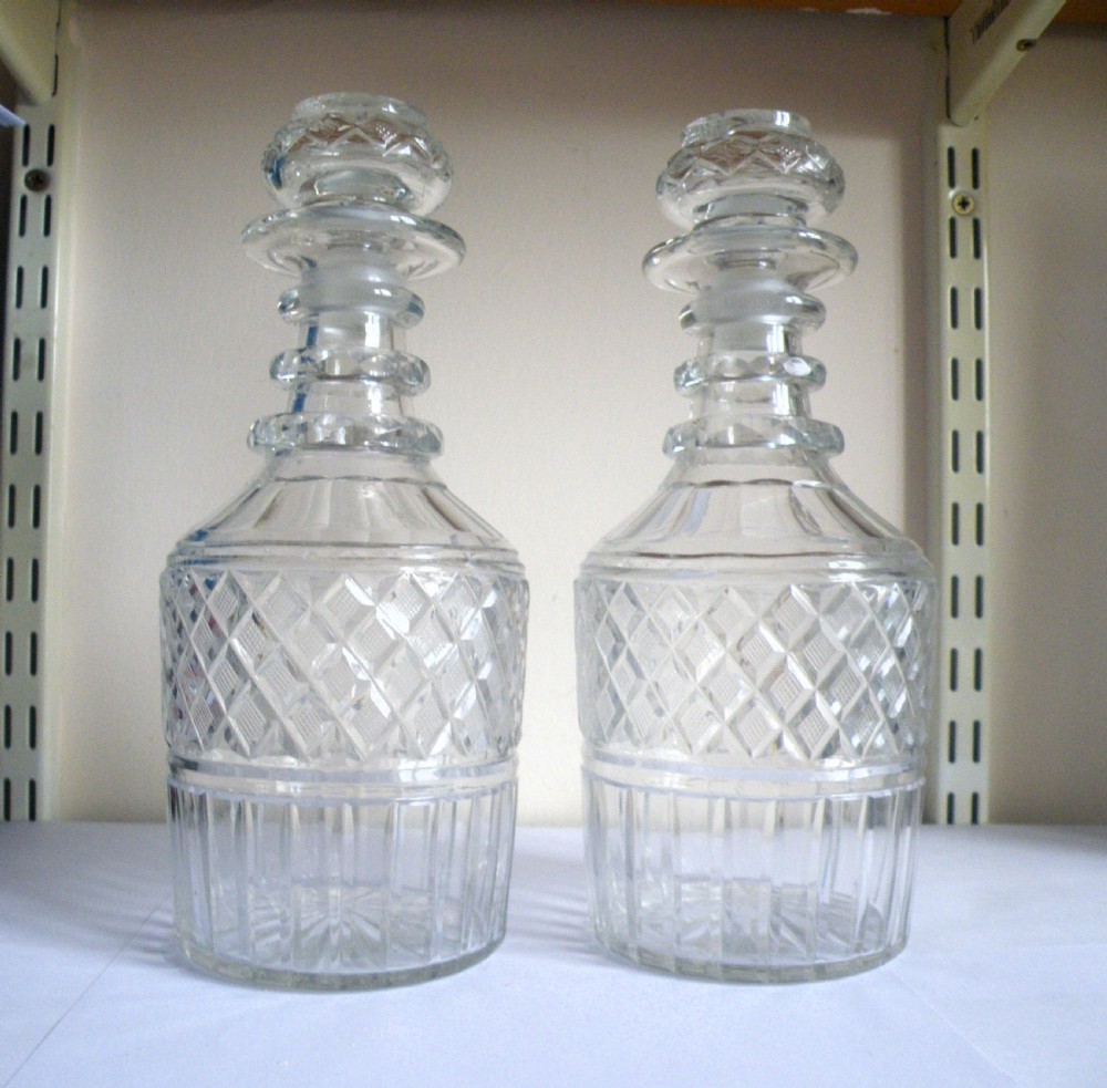 a pair of georgian full size cut glass decanters