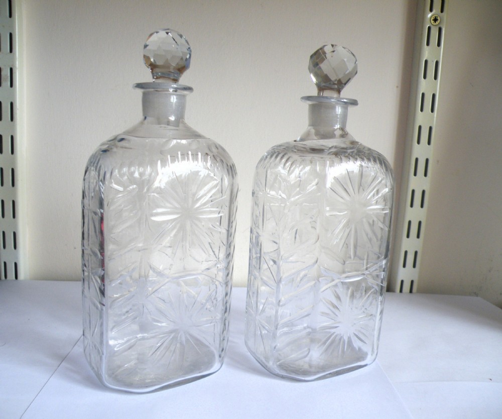 a pair of 18th century cut glass spirit decanters