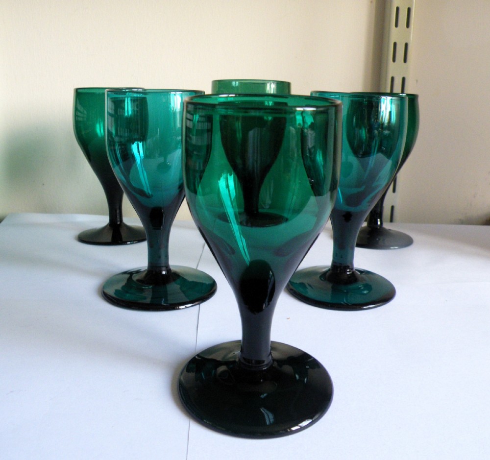 a usefull collection of 6 georgian bristol green wine glasses