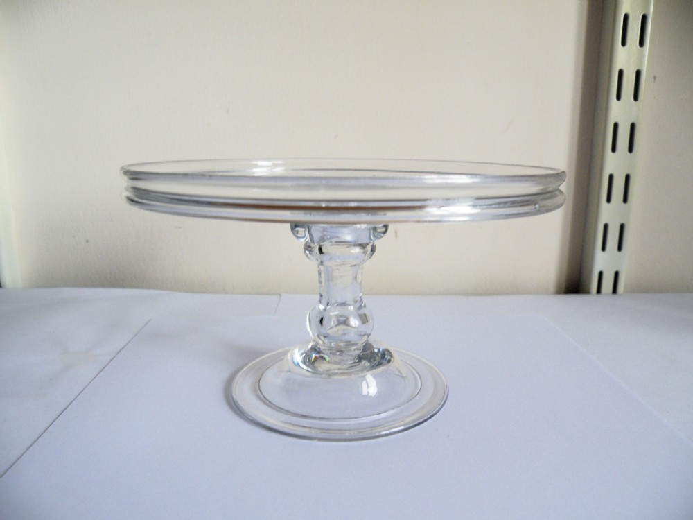 a rare 18th century glass patch stand